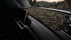 Olive botanical dashboard mat fitted in a car's cabin
